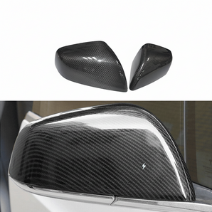 Real carbon-fiber mirror covers installed, black weave pattern with reflective shine
