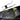 Carbon fiber console side trim with textured weave around seat-side controls