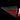 Carbon fiber charging port cover with red rectangular reflector inset, side angle.