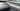 Carbon fiber dashboard cover side trim with textured weave finish