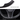 Close-up of carbon fiber steering wheel cover insert with curved weave texture