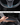 Carbon fiber steering wheel cover with stitched grip and blue accent line