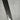 Close-up of black carbon fiber weave panel for trunk chrome trim