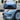 V-style front lip splitter with carbon-fiber look on front bumper