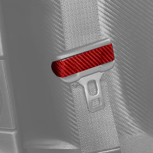 Red carbon fiber seat belt cover insert with weave pattern on seatbelt anchor