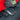 Rear center console storage organizer box with divider and textured insert, dark with silver trim