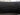 Black TPE trunk lid protector mat installed on cargo area trim with glossy top