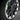 Wheel rim protector with green edge trim on black alloy wheel