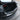 Installed black door sill protector trim around the car door sill opening and edge
