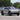 Front license plate holder on gray pickup truck front bumper