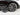 Wheel cover set on car wheel, dark multi-spoke pattern with center cap