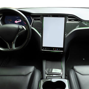 Carbon fiber dashboard trim surround around infotainment screen and center vents