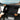 Rotating touchscreen mount with hand adjusting screen angle on dashboard