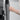 Hand installing a silicone door handle cover over the handle and latch area