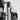 Silicone door handle cover installed on door frame, black with red side detail