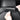 Foldable car headrest hanger hook with three slots, held by hand