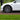 Gun gray wheel cover on car wheel, multi-spoke Gemini style