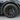 Black turbine-style wheel cover with center cap and sharp multi-spoke blades