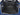 Black cargo floor mat liner set covering cargo area with molded channels