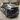 Gloss black carbon-fiber rear diffuser lip attached to the lower rear bumper