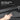 Car side trunk upper protector wiped clean over textured trim near control button