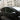 Side window rain visor on Tesla Model Y with carbon-fiber look trim stripe