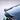Glossy black ABS rear spoiler wing for Tesla Model 3, curved edge detail