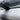 Close-up of a seated black rubber seal along the car door sill and frame.