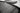 Close-up of dark rubber trunk mat ridges and raised channels for grip