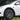 Gun gray wheel cover on car wheel, multi-spoke Gemini style with tire