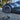 Dark aero hubcap installed on rear wheel with split-spoke design