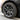 Gun gray aero wheel cover with multi-spoke design, mounted on a car wheel
