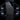 Multiple striped geometric logo puddle light projections around car doors