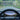 Car dashboard screen showing front camera parking view