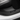 Carbon-fiber textured black door sill protector with Model Y badge