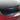 Black trunk sill plate protector with textured grip ridges along the edge