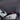 Folded roof sunshade cover with red edge trim on car roof
