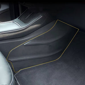 Black center console side protector with yellow-trimmed stitched edge for snug fit