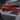 Red carbon-fiber gear stalk cover with PRND icon cutouts