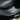 Black car door sill protector with scuff guard along interior threshold