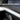 Car door trim cover with thin blue accent line on inner door panel