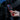 Red slim key card holder with strap, held near car door, dark card window