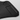 Black carbon-fiber tray table with molded cup holder detail and textured surface