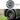 Gun grey wheel cover with induction-center spokes, close-up on mounted wheel