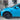 Black wheel cover with multi-spoke design on front wheel of blue car