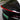Rear trunk spoiler on black car with red accent strip